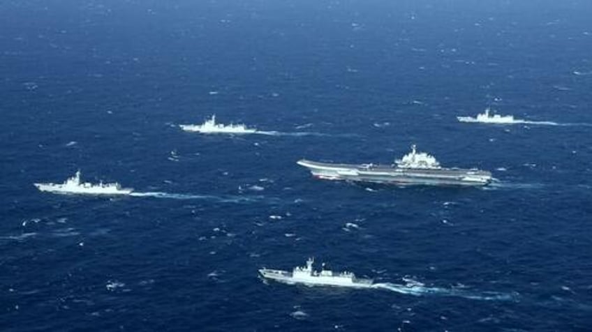 china deploys astonishing number of warships after taiwan presidents trip to hawaii guam 