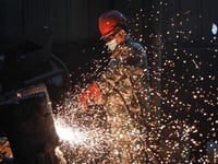 China factory output beats forecasts, weathering tariffs
