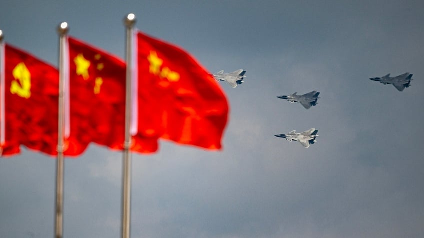 china flies more than 150 military planes toward taiwan as island condemns military harassment