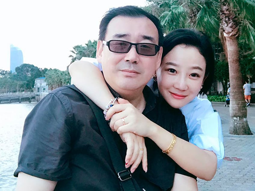 This undated, file photo released by Chongyi Feng shows Yang Hengjun and his wife Yuan Xiaoliang. Australia says it is appalled at China’s suspended death sentence for Chinese Australian writer and democracy blogger Yang Hengjun. (Chongyi Feng via AP, File)