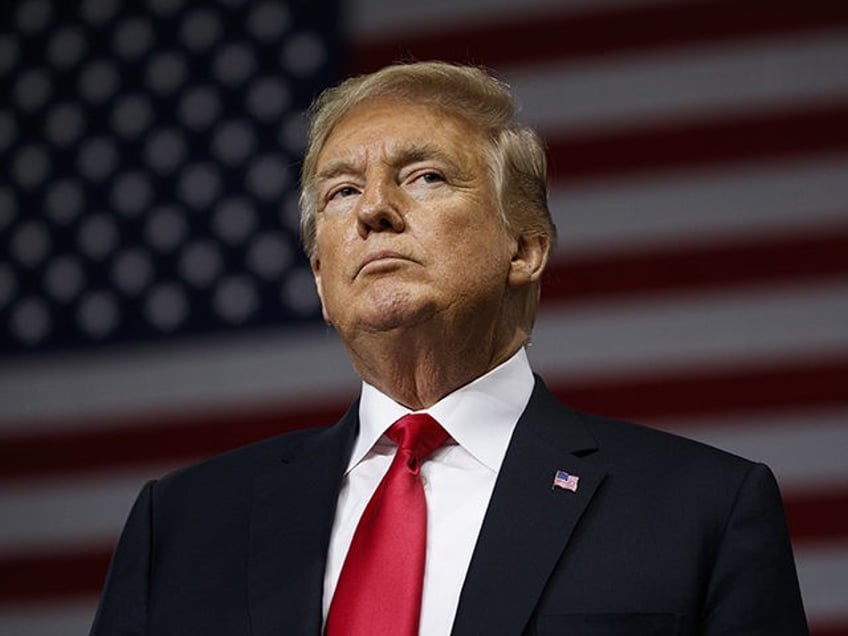 FILE - In this July 31, 2018, file photo, President Donald Trump pauses during remarks at a campaign rally at Florida State Fairgrounds Expo Hall in Tampa, Fla. The Robesonian paper in Lumberton, N.C., announced it’s dropping an 8-page color comics section from Sunday editions. A newspaper editorial said it …