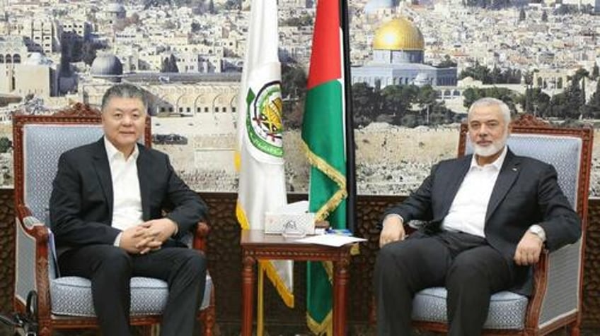 china hosts hamas palestinian authority for rare talks