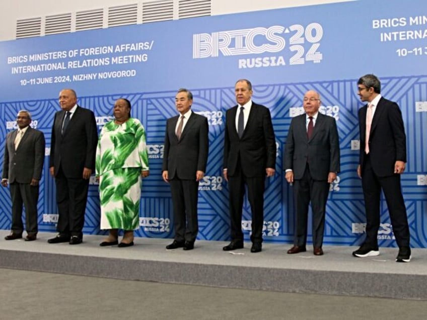 From left, India's BRICS Sherpa Dammu Ravi, Egypt's Foreign Ministers Sameh Shoukry, South