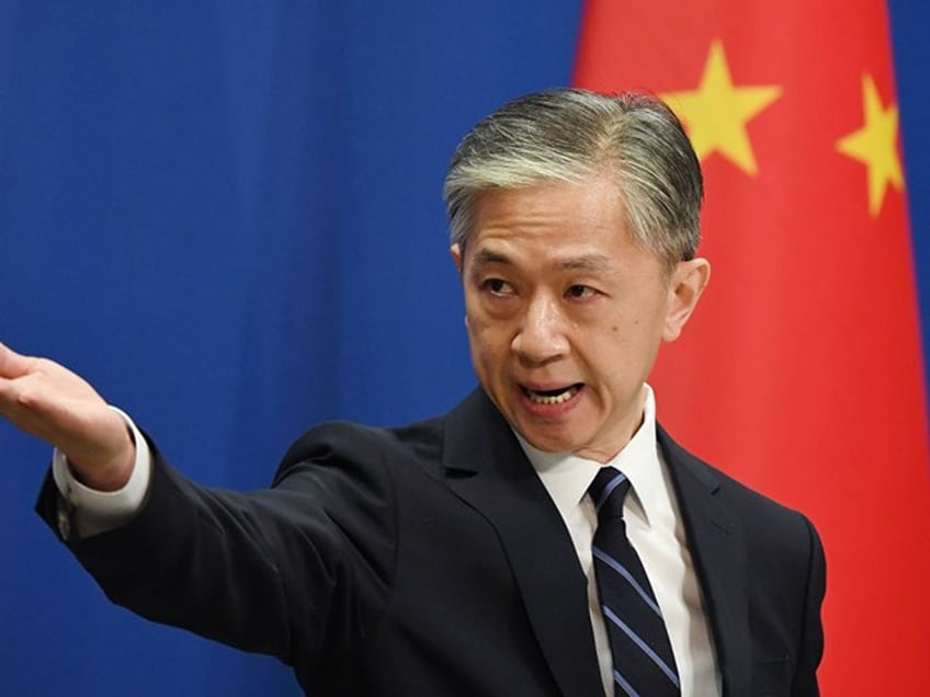 Chinese Foreign Ministry spokesman Wang Wenbin takes a question during the daily Foreign Ministry briefing in Beijing on July 24, 2020. - China on July 24 ordered the US consulate in the southwestern city of Chengdu to close in retaliation for one of its missions in the United States being shuttered, capping a furious week of Cold War-style diplomacy. (Photo by GREG BAKER / AFP) (Photo by GREG BAKER/AFP via Getty Images)