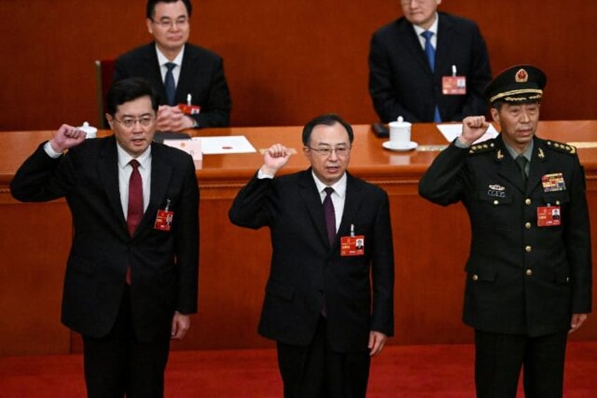 china removes defence minister ousts ex fm from cabinet