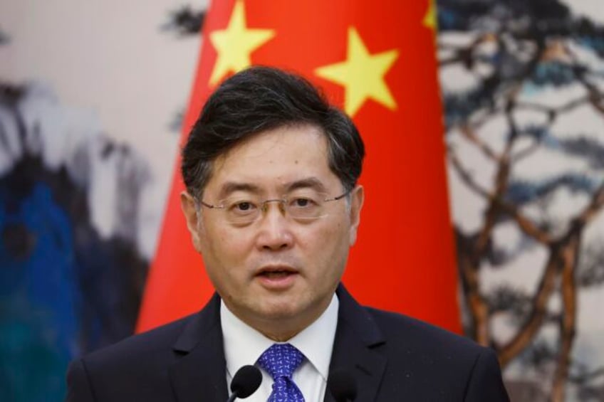 china removes outspoken foreign minister qin gang and replaces him with his predecessor wang yi