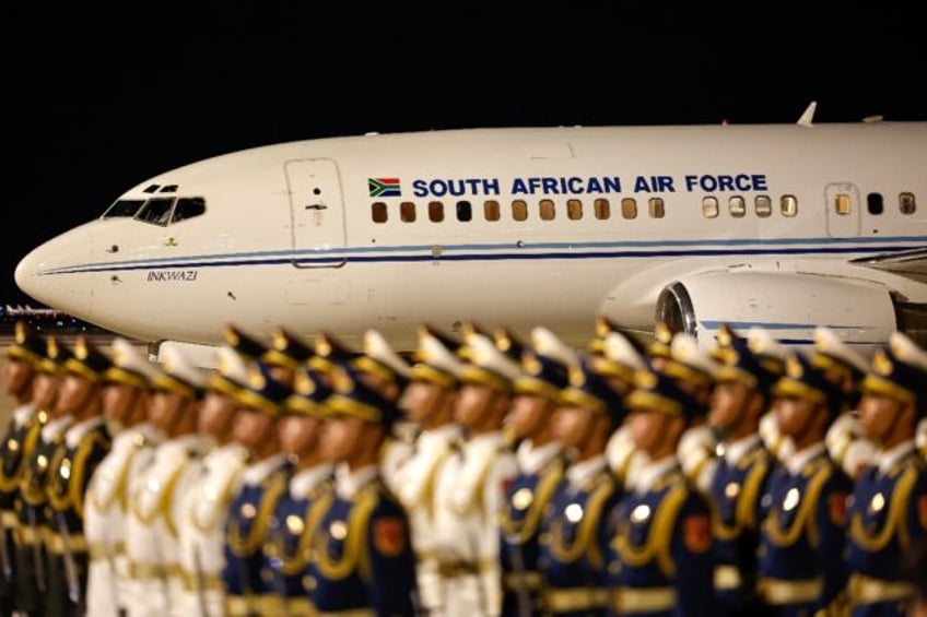 An airplane carrying South African President Cyril Ramaphosa arrives in Bejing ahead of th