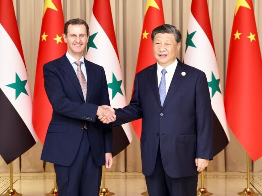 Chinese President Xi Jinping meets with Syrian President Bashar al-Assad in Hangzhou, capi