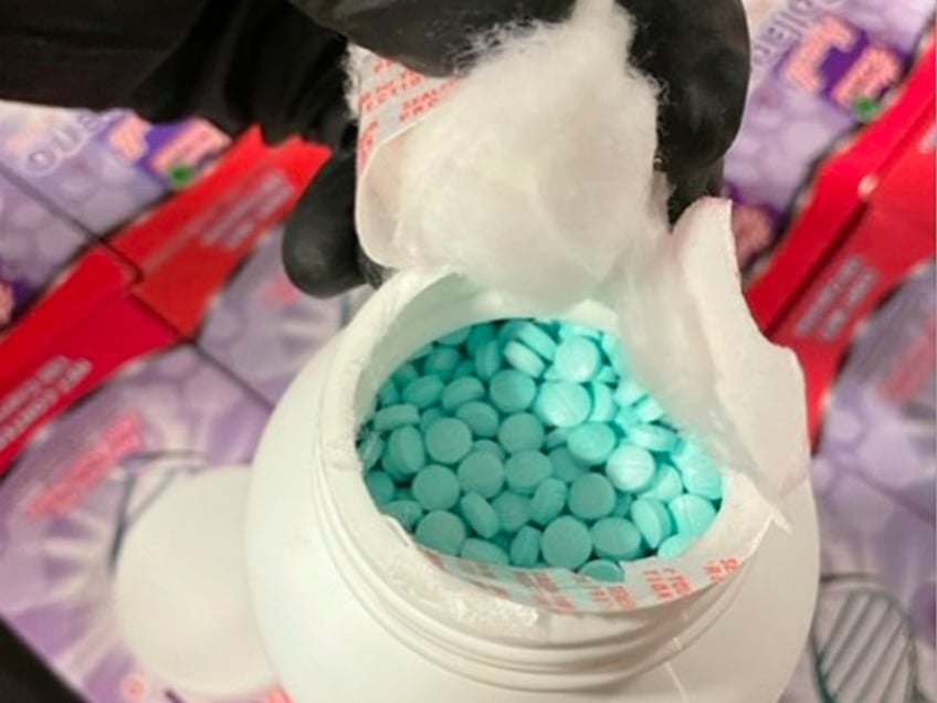 This photo released by the Casa Grande Police Department, shows a collagen supplement bottle that concealed approximately 500,000 fentanyl pills that were found in an SUV pulled over for speeding on Interstate 10 in Pinal County, Arix., on Monday May 23, 2022. Two women, Martha Lopez, 31, and Tania Luna Solis, 30, were arrested Monday after about 500,000 fentanyl pills were found collagen supplement bottles in an SUV pulled over for speeding on Interstate 10 in Arizona, police said.(Casa Grande Police Department via AP)