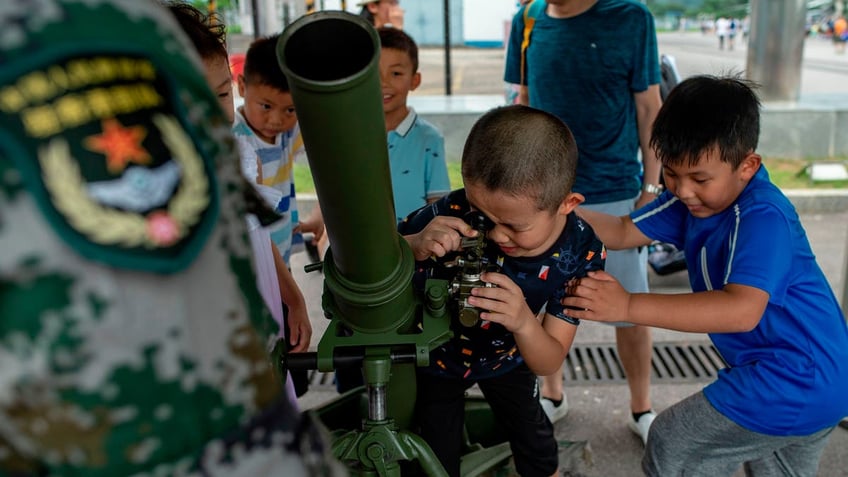 china trains children for iron army in latest effort to create national combat readiness report