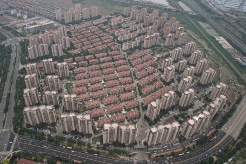 China's property crisis has seen house prices plunge and millions of homes left empty or u