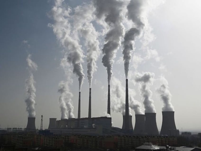 chinas climate envoy it is unrealistic to completely phase out fossil fuel