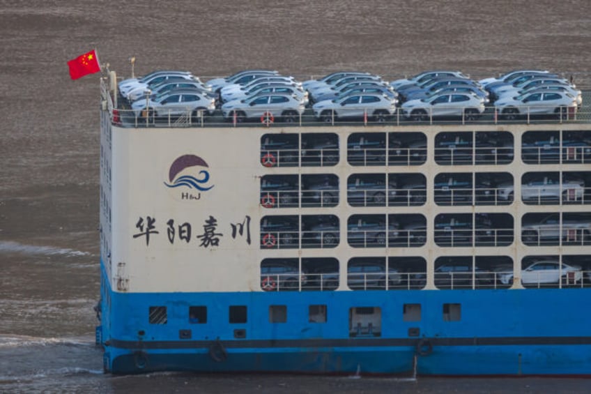 CHONGQING, CHINA - JULY 15: A vehicle carrier ship fully loaded with newly manufactured pa
