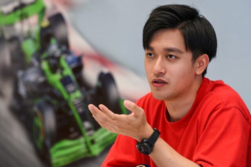 Formula 1 Kick Sauber's Chinese driver Zhou Guanyu speaks during a press conference