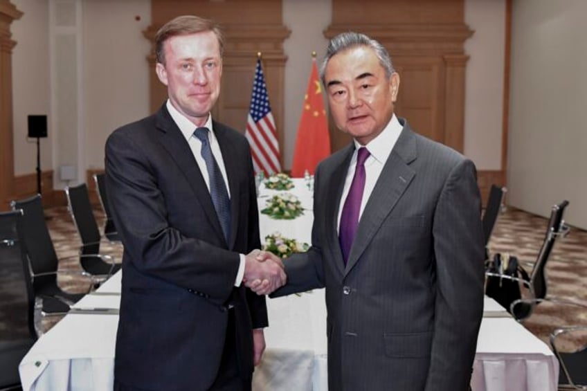 chinas foreign minister heads to russia after meeting with us national security adviser