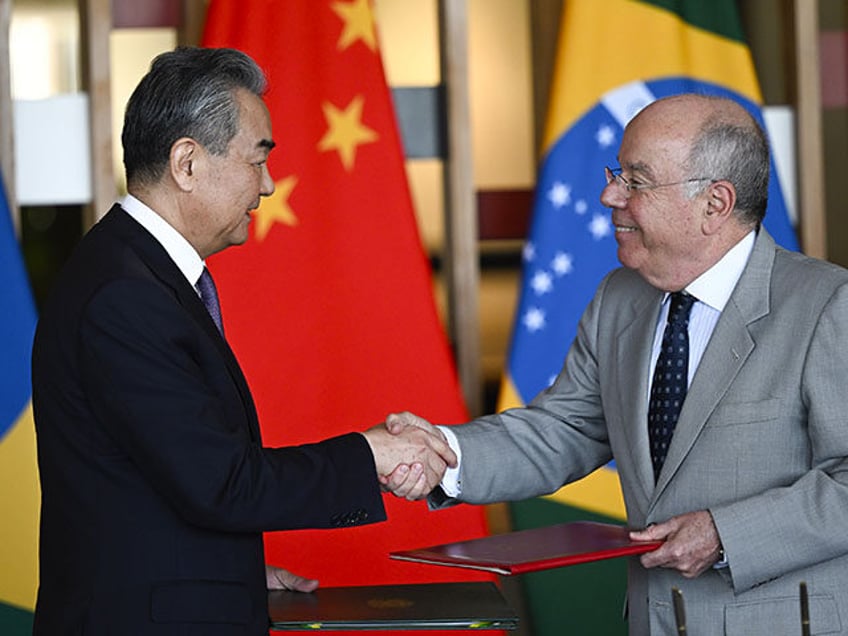 Chinese Foreign Minister, Wang Yi (L) meets with Brazilian Foreign Minister Mauro Vieira (R) at the Itamaraty Palace in Brasilia, Brazil on January 19, 2024. (Photo by Mateus Bonomi/Anadolu via Getty Images)