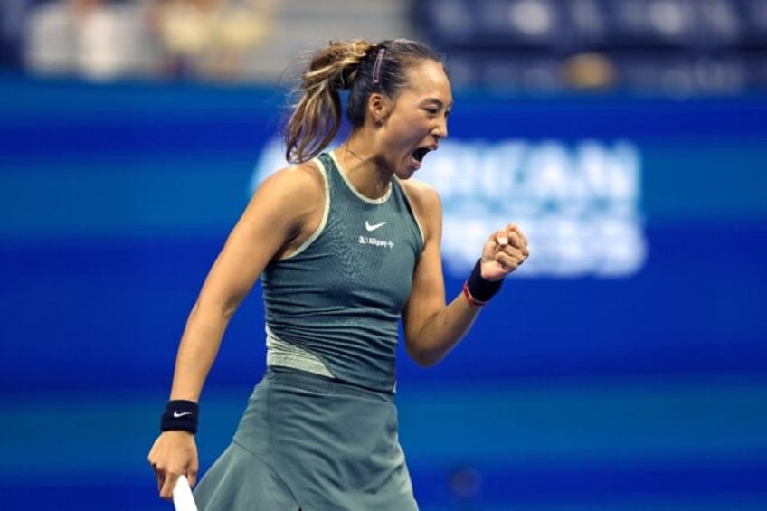 China's Zheng Qinwen celebrates winnning a point at the US Open