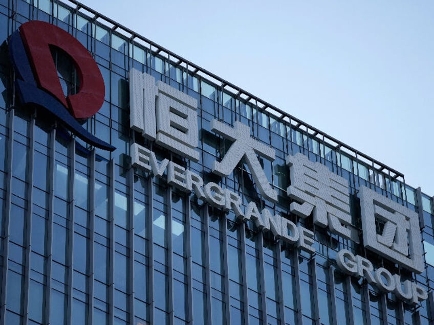 chinas real estate giant evergrande backing out of stock exchanges