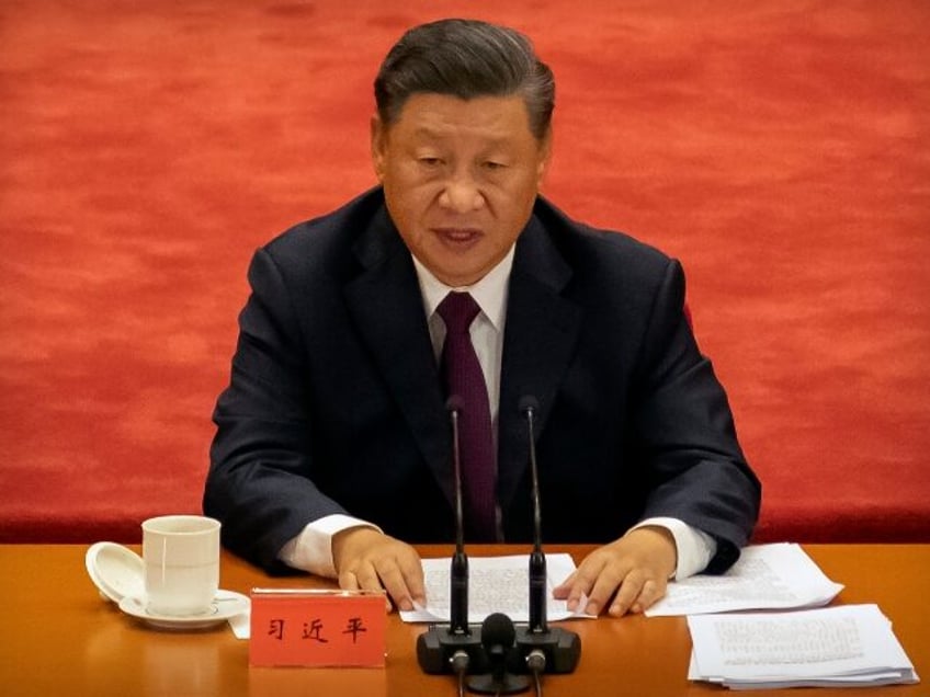 FILE - In this Sept. 8, 2020 file photo, Chinese President Xi Jinping speaks during an eve