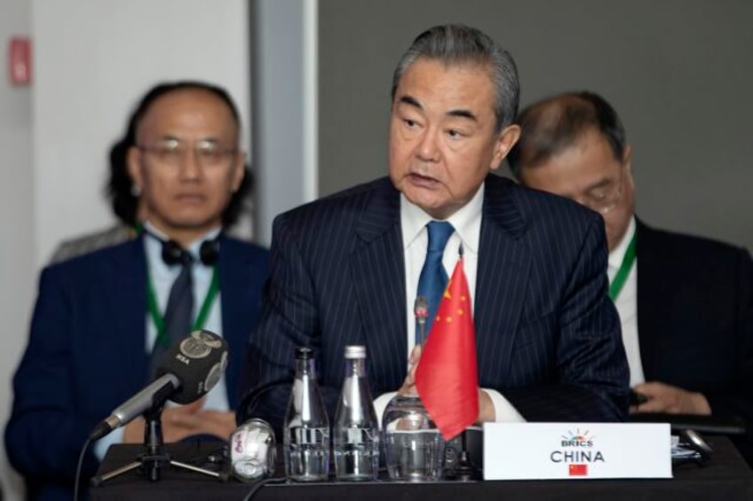 chinas sharp tongued foreign minister is ousted but his combative style is expected to continue
