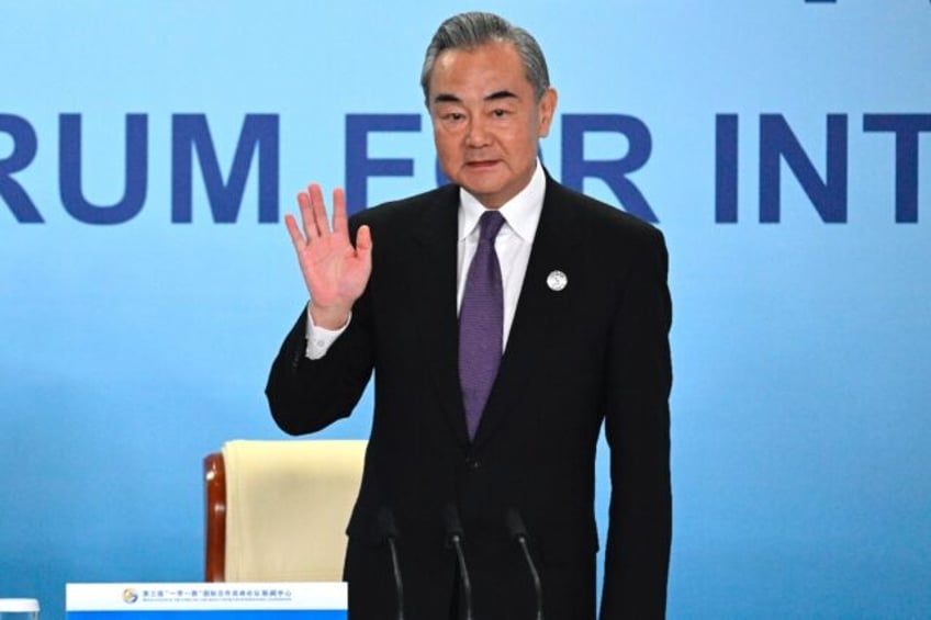 chinas top diplomat starts us visit as biden stands firm