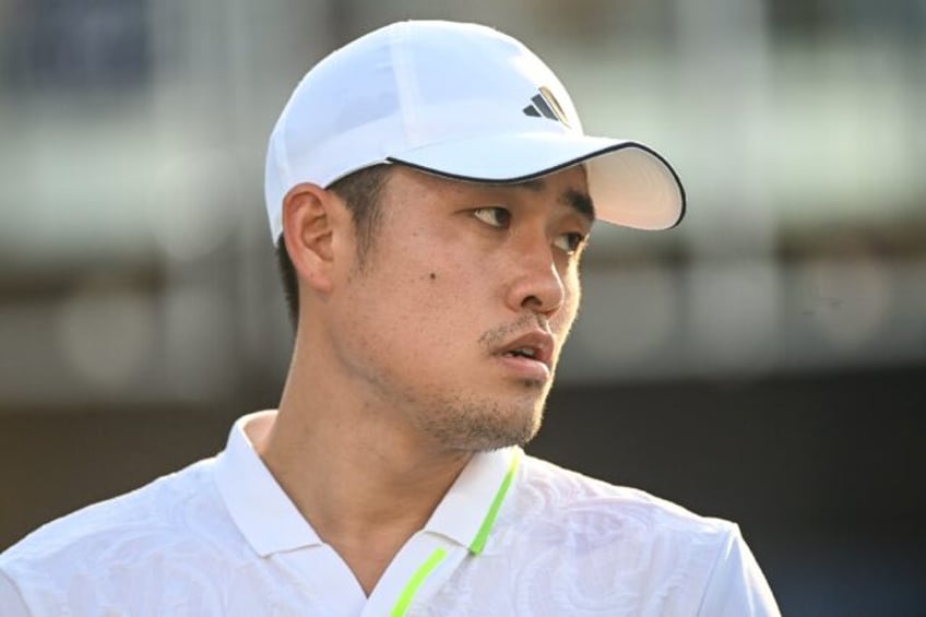 chinas wu collapses while leading atp washington opener