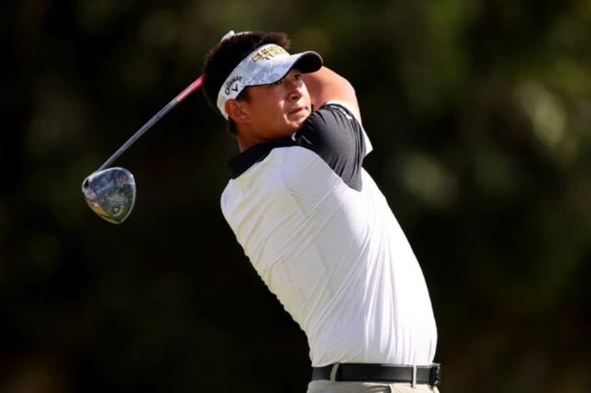 China's Carl Yuan plays a shot on the way to a share of the halfway lead in the US PGA Tour Sony Open in Hawaii