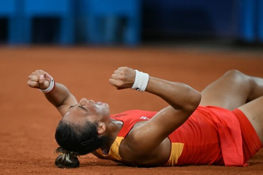 China's Zheng Qinwen celebrates reaching the semi-finals at the Paris Olympics