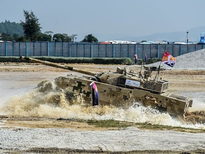 ZHUHAI, CHINA - NOVEMBER 01: A VT4 main battle tank, also known as the MBT3000 performs du