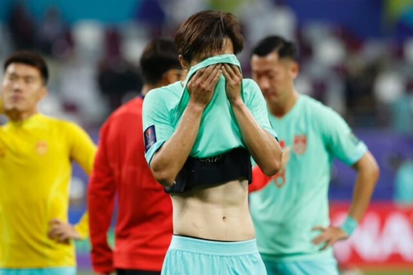 China's Xie Pengfei after the Qatar defeat