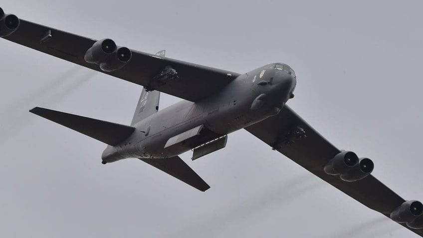 chinese fighter jet flies within 10 feet of us b 52 bomber us military