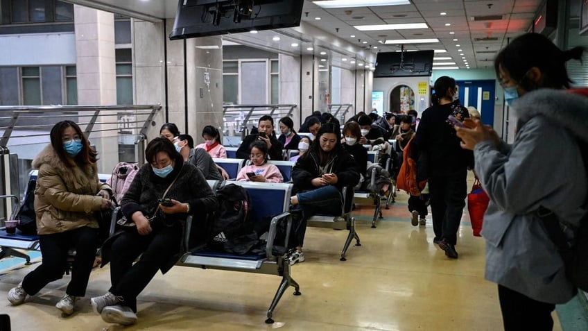 chinese officials say surge in respiratory illness likely not caused by novel pathogen