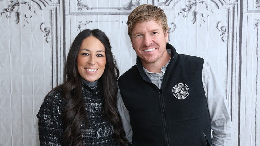 Joanna and Chip Gaines posing on the red carpet