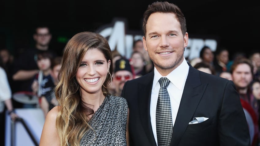 Katherine Schwarzenegger Chris Pratt smiling on red carpet