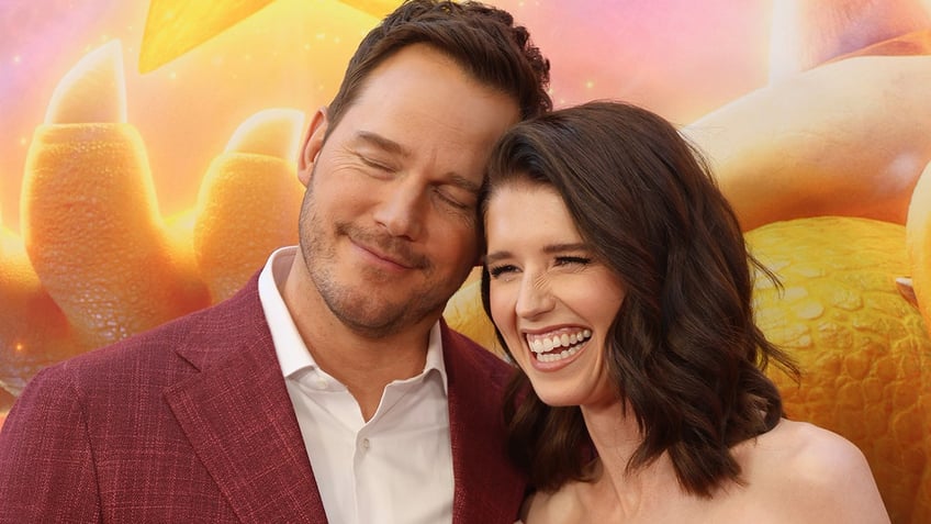 Chris Pratt leans on Katherine Schwarzenegger at red carpet premiere