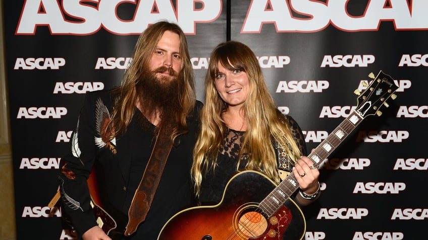 chris stapleton explains how he and wife keep romance alive overcome obstacles together