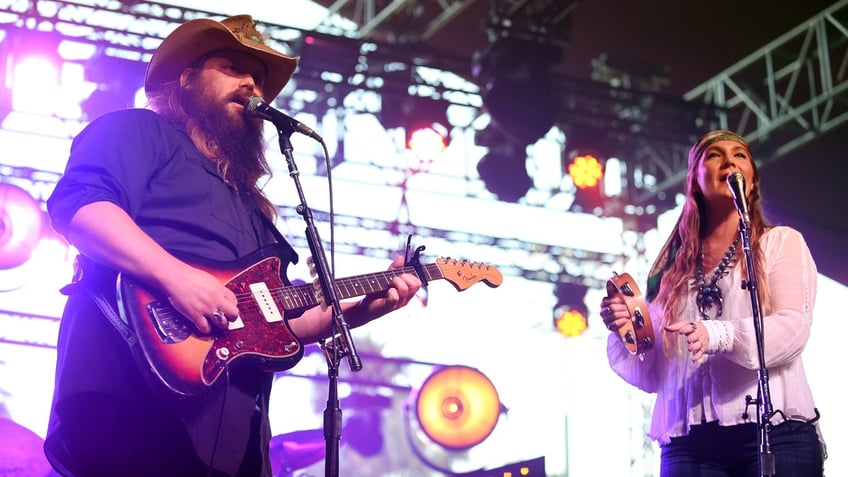 chris stapleton explains how he and wife keep romance alive overcome obstacles together