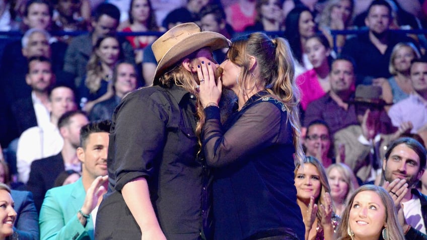 chris stapleton explains how he and wife keep romance alive overcome obstacles together