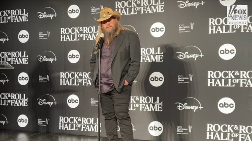 chris stapleton explains how he and wife keep romance alive overcome obstacles together