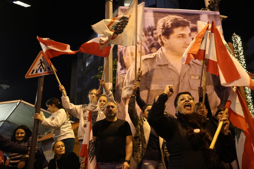 christians in lebanon celebrate downfall of assad while those in syria worry about future