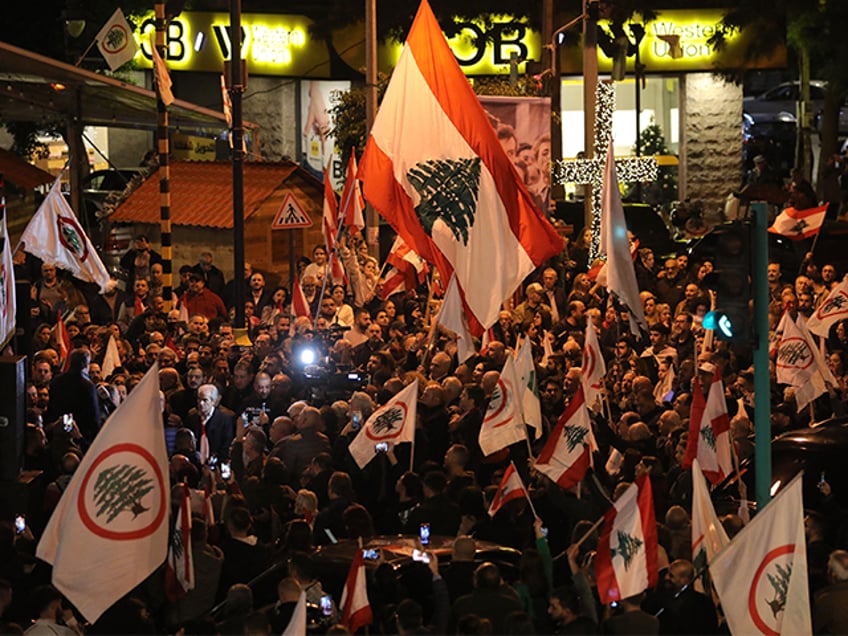 Supporters of the Christian Phalange party and the Lebanese Forces Party gather to celebra