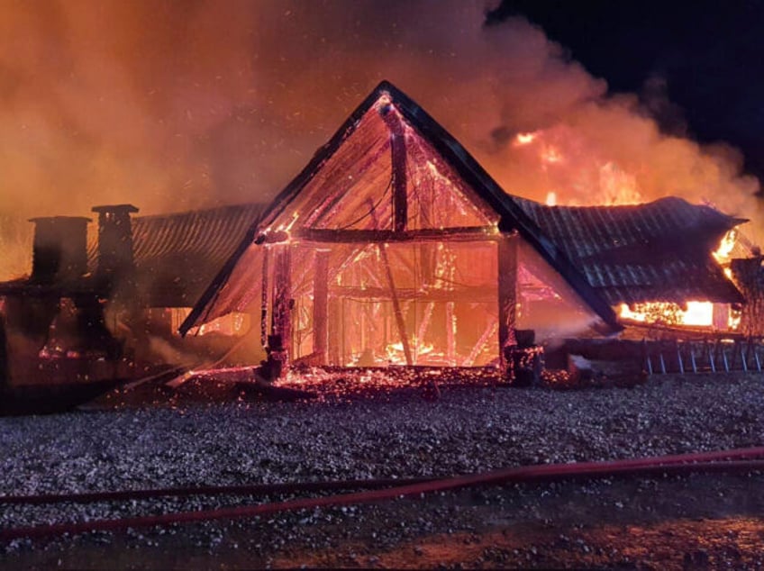 In this photo released by the Romanian Emergency Services Prahova (ISU Prahova), a guesthouse is in flames, in Tohani, Romania, Tuesday, Dec. 26, 2023. A huge fire at a guesthouse in Romania on Tuesday morning has left several people dead, including a child, and some people are missing, authorities said. …