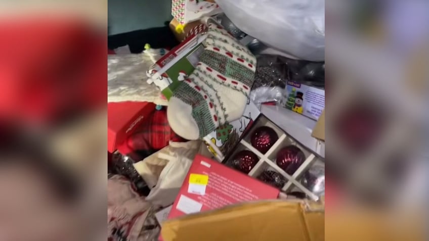 woman saves money on decorations by dumpster diving