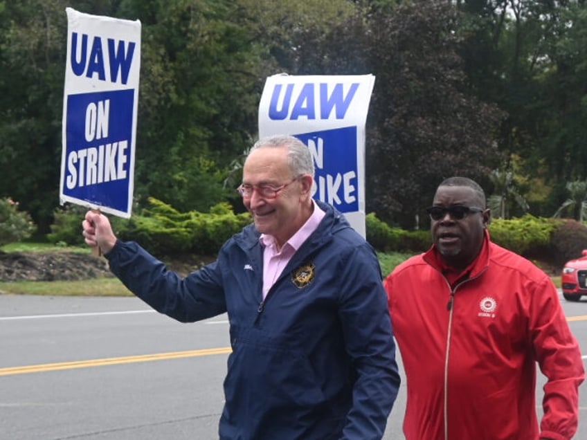 chuck schumer strikes alongside united auto workers as biden plays catchup with trump