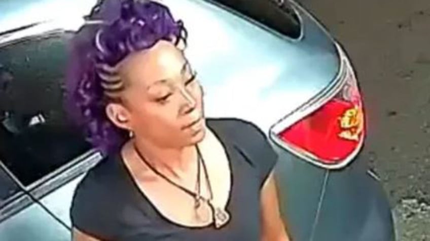 Woman with purple hair see at homicide scene