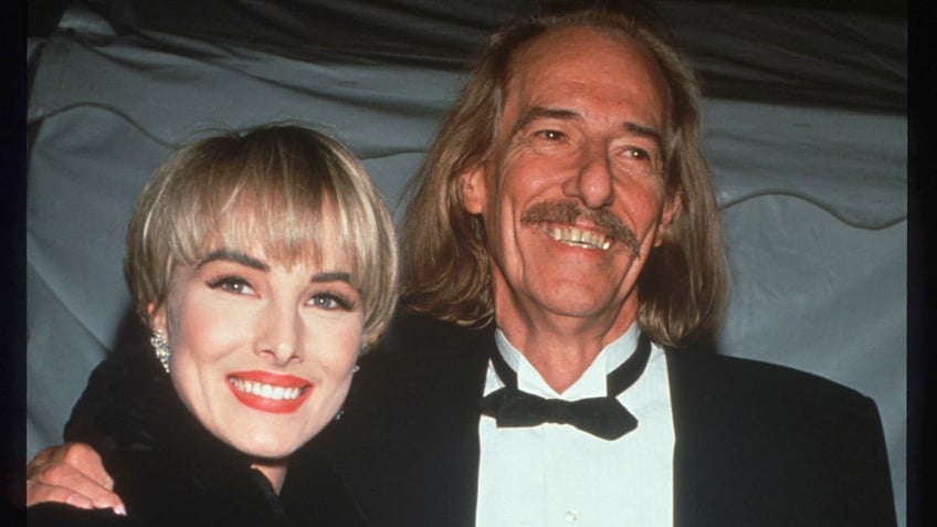 Chynna Phillips posing with her father John Phillips