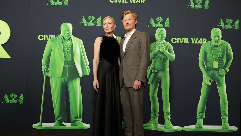 Kirsten Dunst (L) and Jesse Plemons attend the Los Angeles Premiere of A24's "Civil War" at Academy Museum of Motion Pictures on April 02, 2024 in Los Angeles, California.