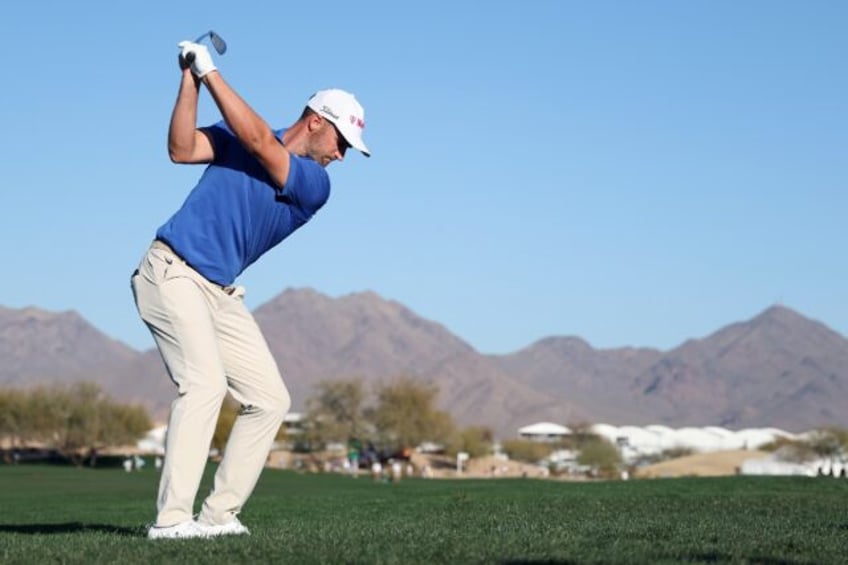 American Wyndham Clark plays the 15th hole on the way to the first-round lead in the US PG