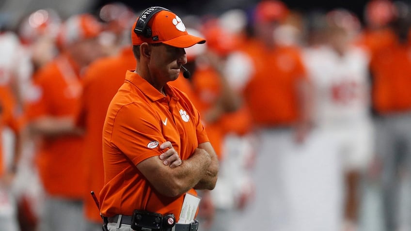 Dabo Swinney looks on field