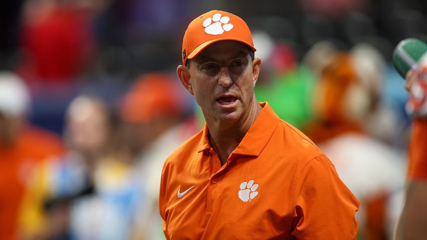 Dabo Swinney looks on field